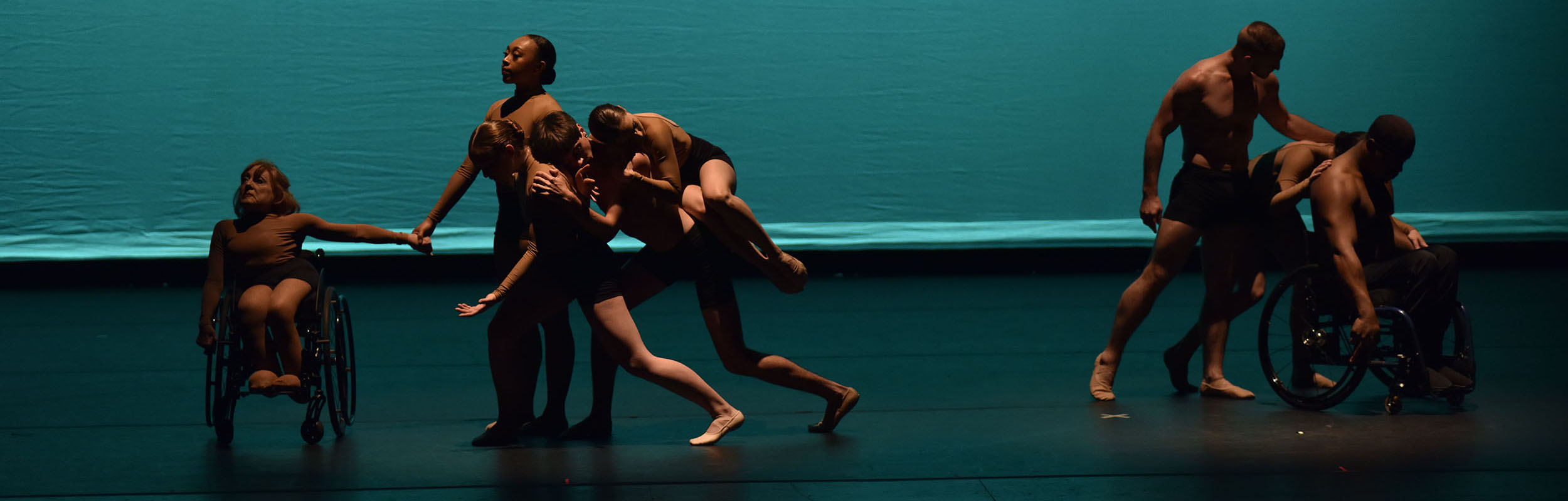 Dancing Wheels Company dancers with and without disabilities performing onstage